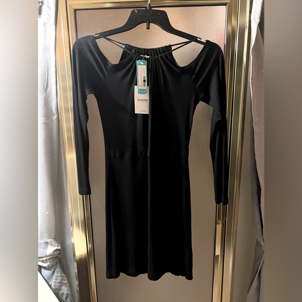 Brand new with tags, black open shoulder dress, form fitting.